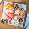 Reserve a table at Tom's Kitchen!