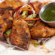 Chef's Tasting Dinner For 2 With A Bottle of Wine at Badshah