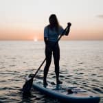 Paddle Surf al amanecer o atardecer en Barcelona