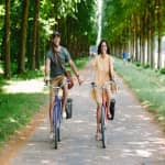 From Paris: Highlight of Versailles Full Day Bike Tour with Royal Gardens, Queens' Hamlet, & Picnic Stop