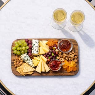 2 Glasses of Cava or Wine + Cheese Board in La Catorce Sky Bar