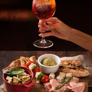 ﻿Italian appetizer with tavola and beverages at Pizzart