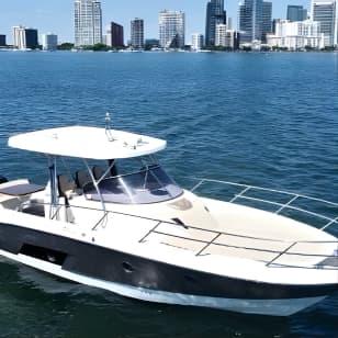36 Ft Boat with Cabin and Bathroom, Champagne included.