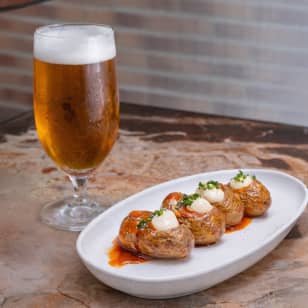 Tapa de bravas and beer or wine in Tilda Neotaberna