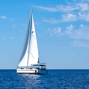Private sailboat ride along the coast of Barcelona with snacks and drinks