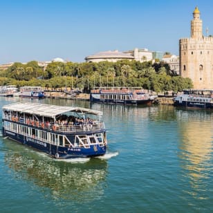 Seville Adventure Pack: Bus Excursion + Panoramic Cruise on the Guadalquivir River + Guided Visit