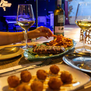 Música en directo y cena para dos con una botella de vino 4