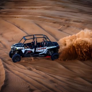 Polaris 1000CC 4Seater Buggy Rental in an open Desert Safari 2
