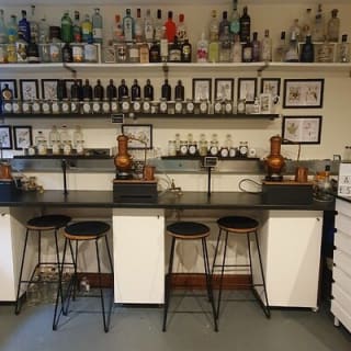 Distill a bottle of gin on mini copper stills 4