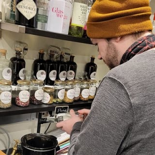 Distill a bottle of gin on mini copper stills 9