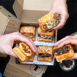 Tino's menu for two: empanada, pizza and burrito all in one 5