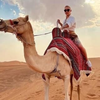 Sunset Desert Safari mit Quad, Sandboarding, Kamelritt + BBQ-Dinner 2