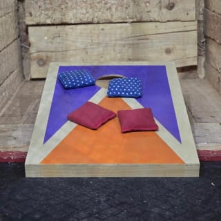 🌽 ¡Reto de Cornhole + bebida + un aperitivo por solo 9 €! 🎉 2