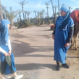 Camel ride at sunset in Marrakech palm grove 15