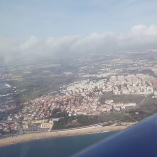 Voo panorâmico sobre Lisboa num avião ligeiro 3