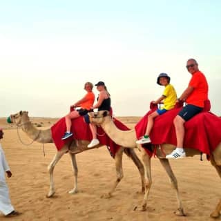 Camel Ride Safari in Red Dunes