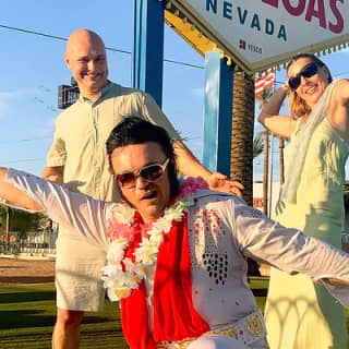 Get Married by Elvis at Las Vegas Sign with Photos lncluded
