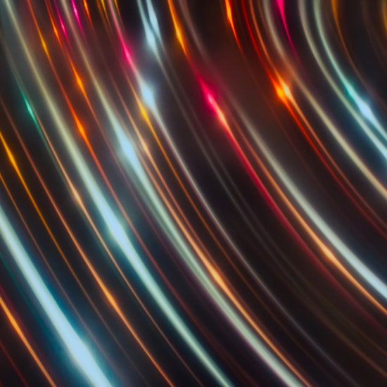 Abstract light trails in a dark room.