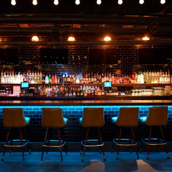 Live It Up This NYE at Slate NYC w/ a 5Hour Premium Open Bar New