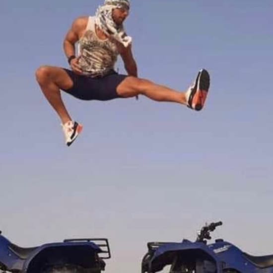 Sunset Desert Safari with Quad Bike, Sandboarding, Camel Ride + BBQ Dinner at Burj Khalifa Tower, Dubai, United Arab Emirates