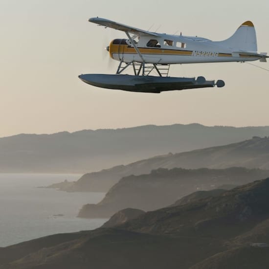 ﻿Gran Área de la Bahía en hidroavión con puesta de sol