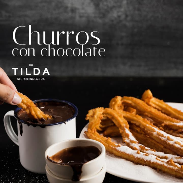 ﻿Churros with chocolate at Tilda Neotaberna Castiza