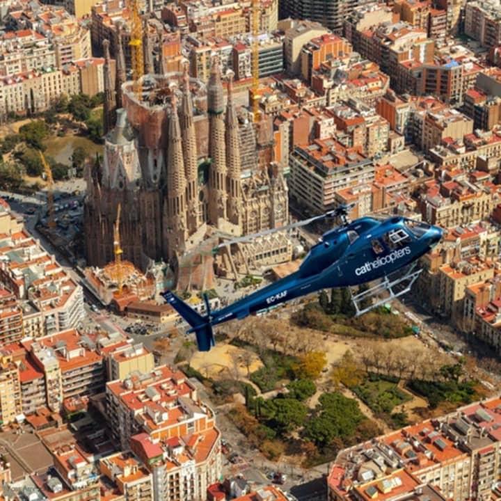 ﻿See the Barcelona skyline flying from a helicopter