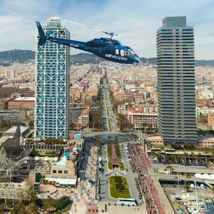 ﻿Helicopter flight over the Barcelona coastline